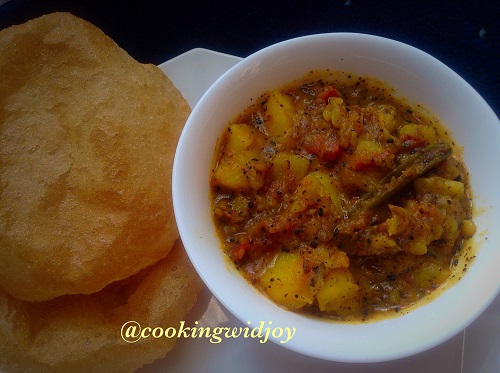 Spicy n tangy Potato curry with puri